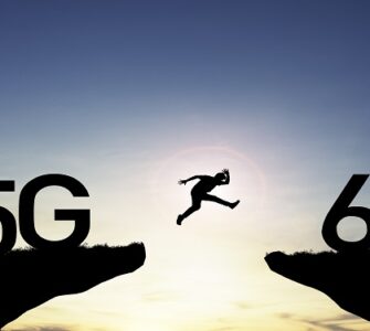 Technology transformation change from 5G to 6G , Silhouette businessman jumping from 5G cliff to 6G cliff on blue sky.