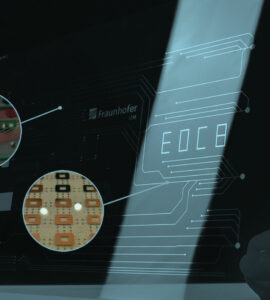 Single layer glass printed circuit board and optical fibers integrated in glass, Fraunhofer IZM