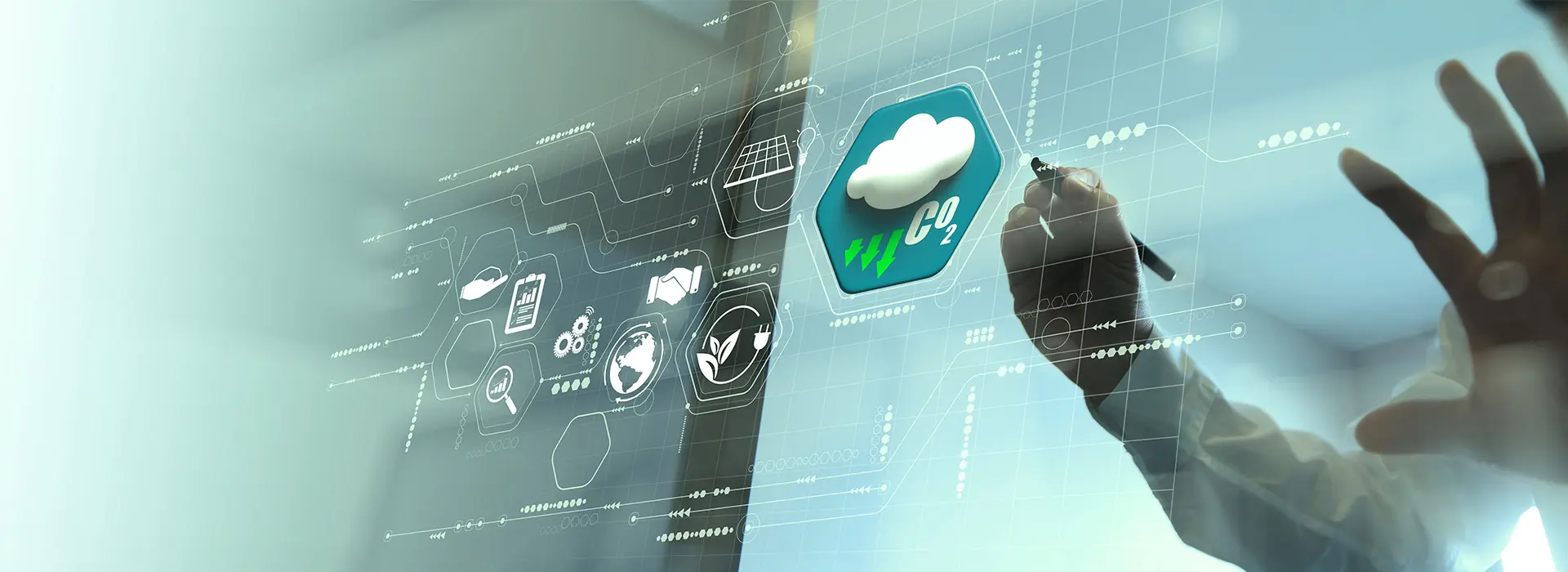 A person is using a transparent, futuristic touchscreen display featuring weather icons and data readouts